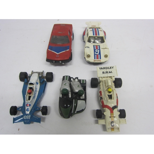 8397 - A collection of playworn Scalextric slot racing cars, accessories and track