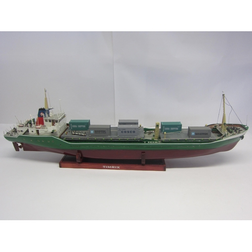 8420 - A wood and fibre glass kit built model ship 'Timrix', finished in green and red with brass propellor... 