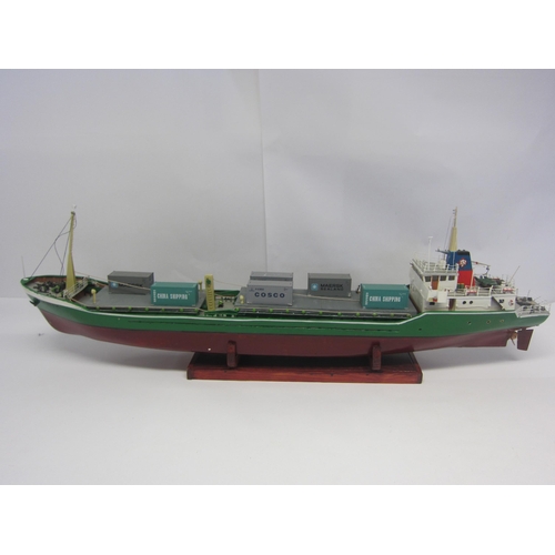 8420 - A wood and fibre glass kit built model ship 'Timrix', finished in green and red with brass propellor... 