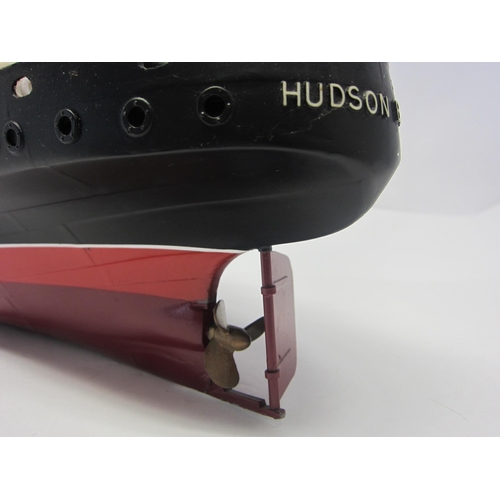 8423 - A wood and fibre glass kit built model ship 'Hudson Bay', finished in black and red with brass prope... 