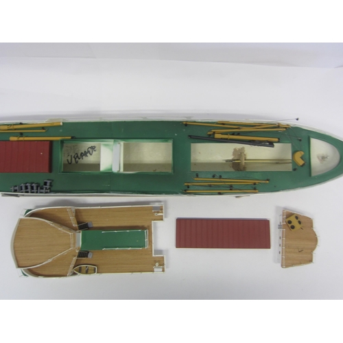 8422 - A wood and fibre glass kit built model ship finished in red, green and white, 109cm long, on stand  ... 