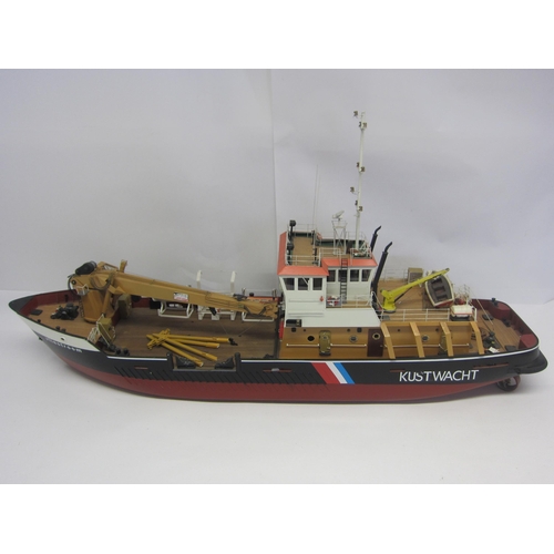 8433 - A wood and fibre glass kit built model ship 'Vliestroom', finished in red, black and tan with twin b... 