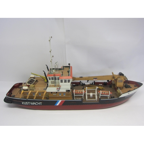 8433 - A wood and fibre glass kit built model ship 'Vliestroom', finished in red, black and tan with twin b... 