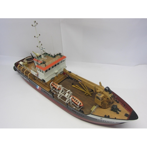 8433 - A wood and fibre glass kit built model ship 'Vliestroom', finished in red, black and tan with twin b... 