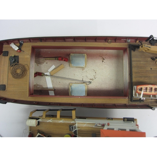 8433 - A wood and fibre glass kit built model ship 'Vliestroom', finished in red, black and tan with twin b... 