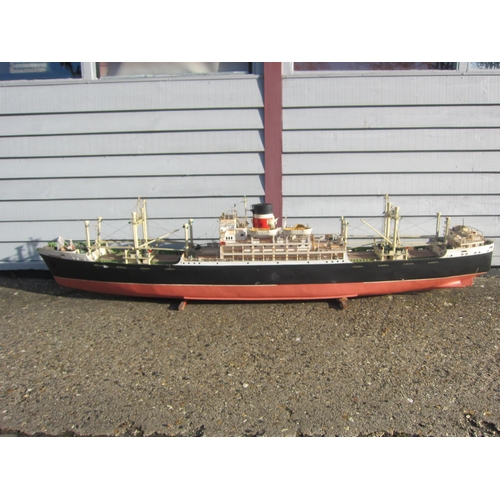 8416 - A large wood and fibre glass kit built model ship 'Proxima Centauri', finished in black, red and whi... 