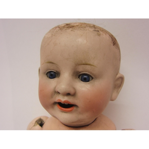 8329 - A late 19th/early 20th Century Franz Schmidt & Co bisque head boy doll with blue glass sleepy eyes, ... 