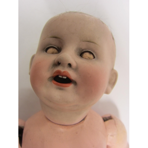 8329 - A late 19th/early 20th Century Franz Schmidt & Co bisque head boy doll with blue glass sleepy eyes, ... 