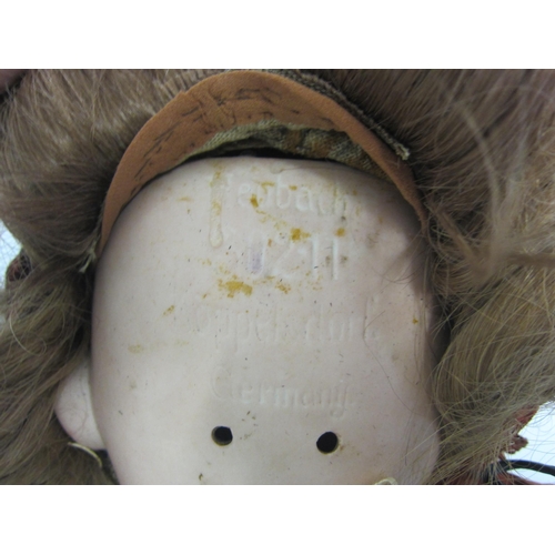 8331 - A Heubach Koppelsdorf bisque head girl doll with blonde wig, brown glass sleepy eyes, painted brows,... 