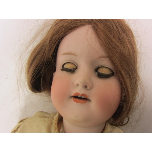 8322 - An early 20th Century Armand Marseille bisque head girl doll with strawberry blonde wig, striated bl... 