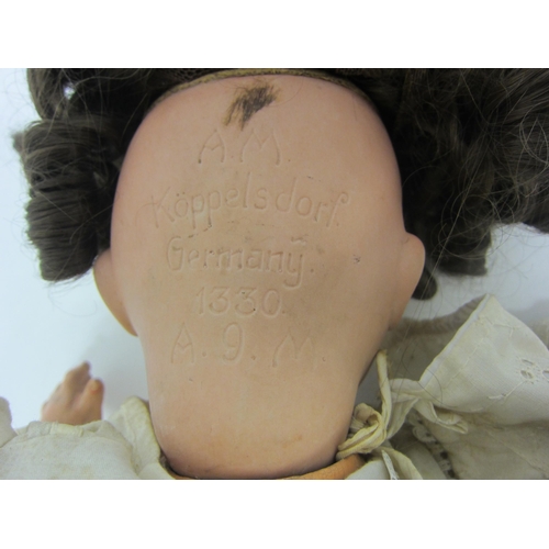 8323 - An Armand Marseille for Koppelsdorf bisque head girl doll with brown ringlet wig, brown glass sleepy... 