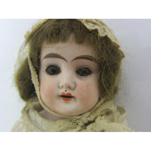 8316 - Two erly 20th Century bisque head dolls to include Trebor 22 socket head doll on articulated composi... 