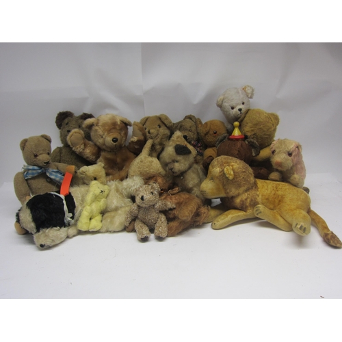 8282 - A collection of mid 20th Century and later teddy bears and soft toy animals including Pedigree dog, ... 