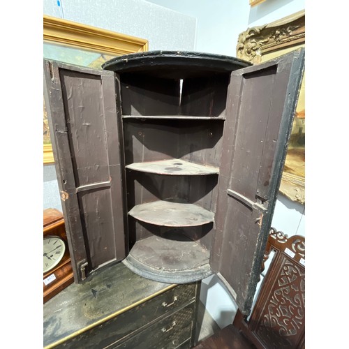 6020 - A Georgian highly decorative bow-front corner cupboard with painted court scene to doors, with pierc... 