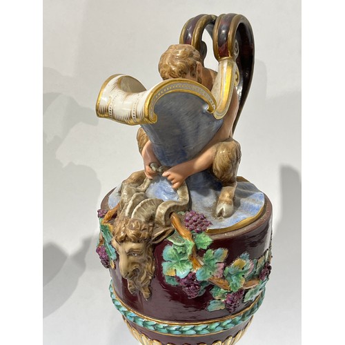 6052 - A pair of late 19th/early 20th Century Naples jugs with Merman and Pan to spout, 40cm tall, approx 2... 