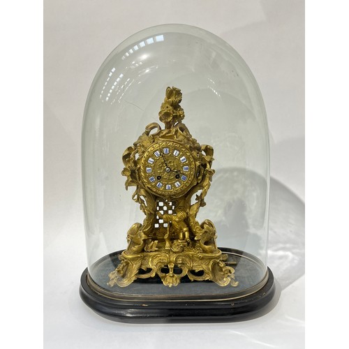 6060 - A mid 19th Century French Raingo Freres ormolu and gilt brass mantel clock, relief moulded Rococo fo... 