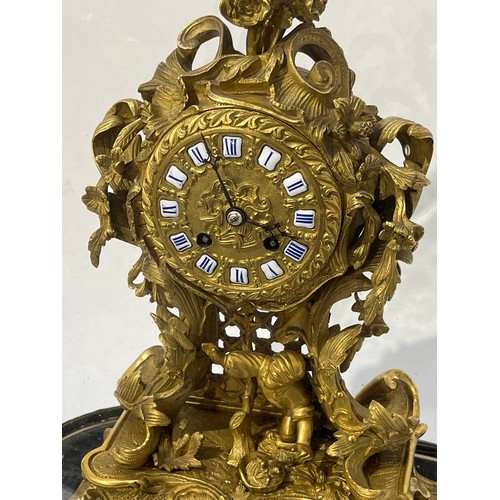 6060 - A mid 19th Century French Raingo Freres ormolu and gilt brass mantel clock, relief moulded Rococo fo... 