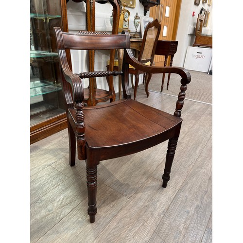 6061 - Circa 1830 an East Anglian mahogany and fruitwood armchair with carved rope twist ring turned back r... 