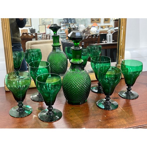 6065 - WITHDRAWN: A late 19th Century green facet decanter and six green glasses of large proportions, 15.5... 