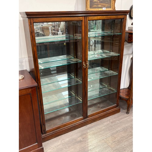 6070 - A Victorian apothecary display cabinet with mirrored back, adjustable shelves interior, two doors, 1... 