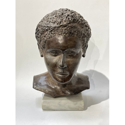 6071 - A bust of a boy by Els Van Foeken on marble plinth bust, signed to underside, 37.5cm tall x 23cm wid... 