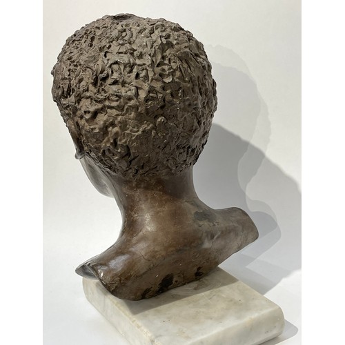 6071 - A bust of a boy by Els Van Foeken on marble plinth bust, signed to underside, 37.5cm tall x 23cm wid... 