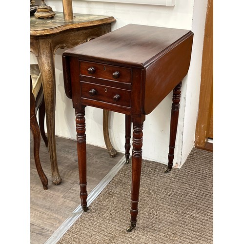 6080 - A Victorian mahogany two drawer drop-leaf work table, on turned supports to castors, 74cm x 31.5cm x... 