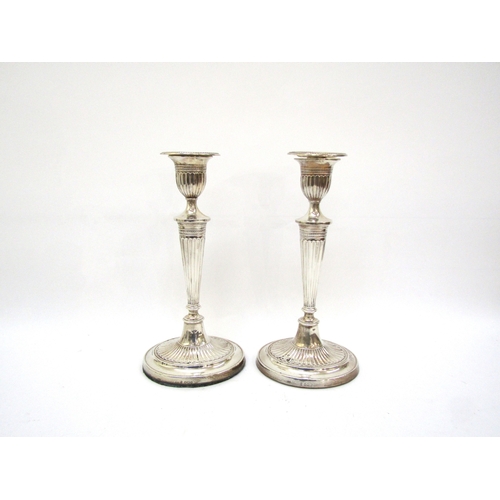 6064 - A pair of Fordham & Faulkner silver Adam style candlesticks with weighted bases, Sheffield 1912, 29.... 