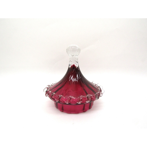 6119 - A cranberry glass lidded jar on pedestal base, one piece of prunt work damaged, 33cm tall