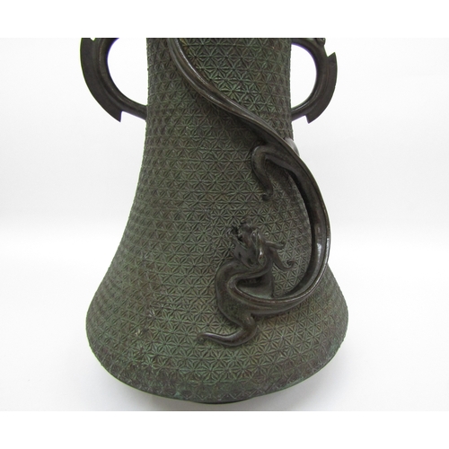 6123 - An Oriental bronze twin-handled vase with applied dragon, signed to base, 31cm tall  )(R)  £180