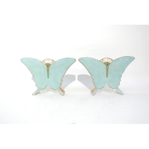 6309 - A pair of Victorian ceramic butterfly vases with lozenge date mark.  One with hairline crack, 13cm x... 