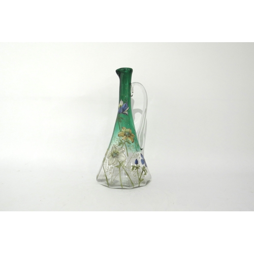 6325 - A late 19th Century faceted jug. Hand painted enamel floral detail, possibly Emile Galle, 26cm tall