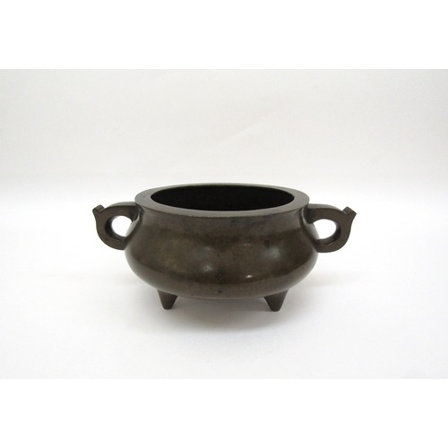 6342 - A Chinese tripod censer, seal mark to base, 8cm tall