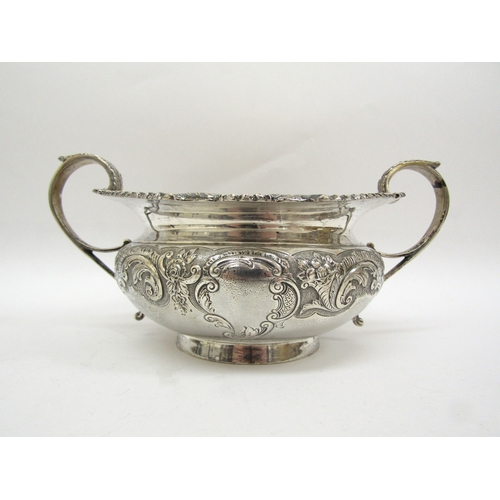 6363 - An Edward Barnard and Sons ornate silver three piece tea set,retailed by Mackay and Chisholm Edinbur... 