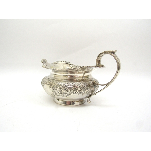 6363 - An Edward Barnard and Sons ornate silver three piece tea set,retailed by Mackay and Chisholm Edinbur... 