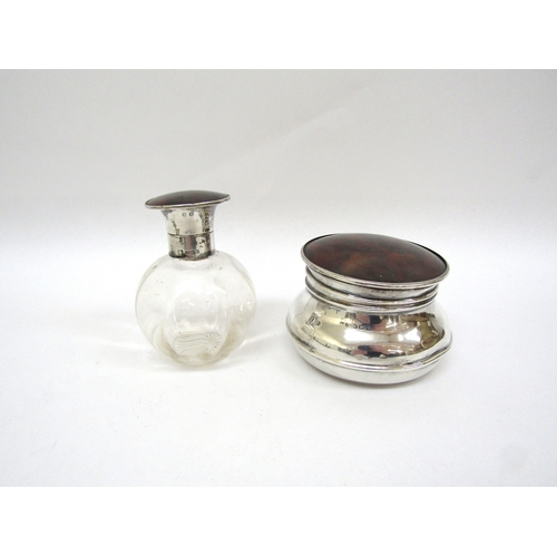 6398 - A tortoise shell lidded silver pot and similar glass bottle (2)