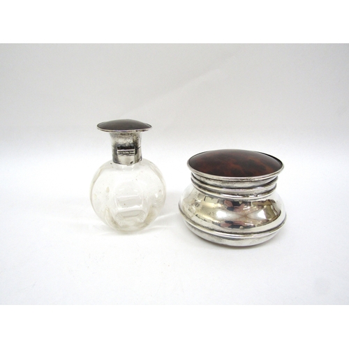 6398 - A tortoise shell lidded silver pot and similar glass bottle (2)