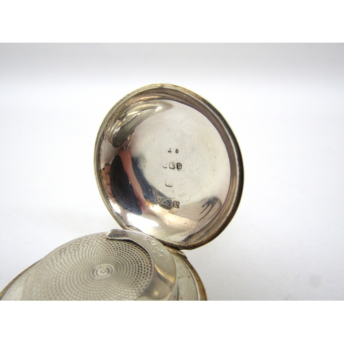 6406 - An E.J Trevitt & Sons silver circular sovereign case with engine turned detail, Chester 1910, 3.5cm ... 