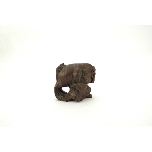 6410 - A Meiji period (1868-1912) Japanese wood Netsuke figure carrying a large root vegetable with mouse t... 