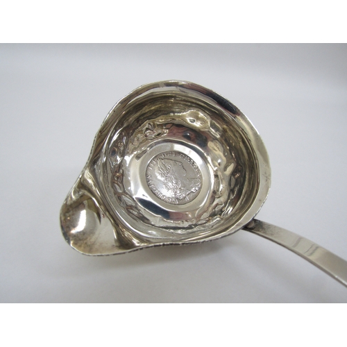 6465 - A Georgian silver punch/toddy ladle set with George III coin, monogram to side dents present, 36cm l... 