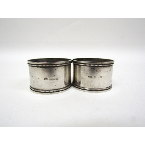 6469 - Five various silver napkin rings, 149g