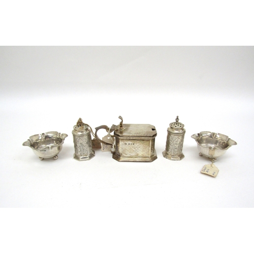 6472 - A silver mustard (no glass liner) pair of Victorian silver pepperettes and two Chester silver salts ... 