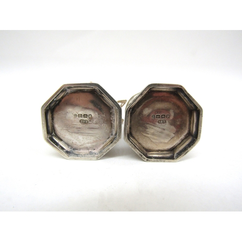 6472 - A silver mustard (no glass liner) pair of Victorian silver pepperettes and two Chester silver salts ... 