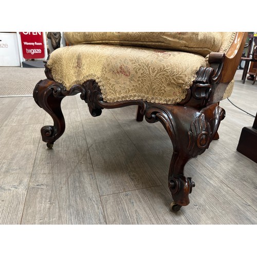 6109 - A circa 1840 mahogany scroll back slipper chair the serpentine front seat over carved scroll cabriol... 