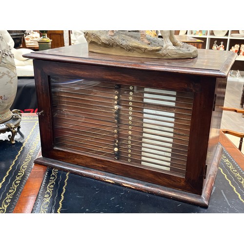 6122 - A late 19th Century mahogany microscope slide cabinet of 21 drawers with glass door. The first 11 dr... 