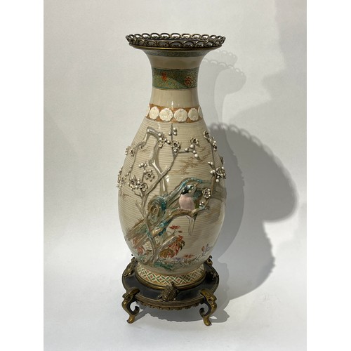 6124 - A large Japanese Satsuma vase with applied brass base and rim, decorated with applied birds and foli... 