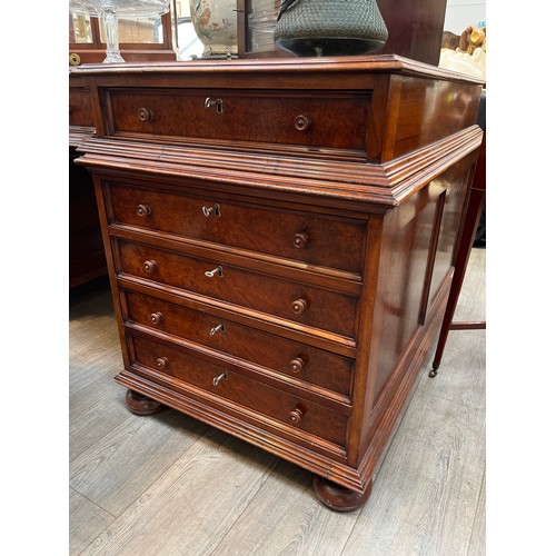 6126 - A reproduction flame walnut partner's desk, the three-section tooled leather top over a three drawer... 