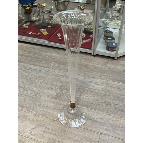 6140 - A pair of late Victorian clear fluted glass vases, 80cms tall, bases 24cm diameter  (C)