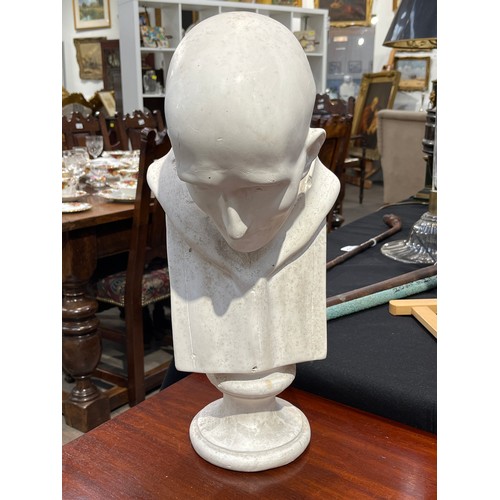 6143 - A plaster bust of St Bruno, on socle base, 50cm tall  (R)  £200