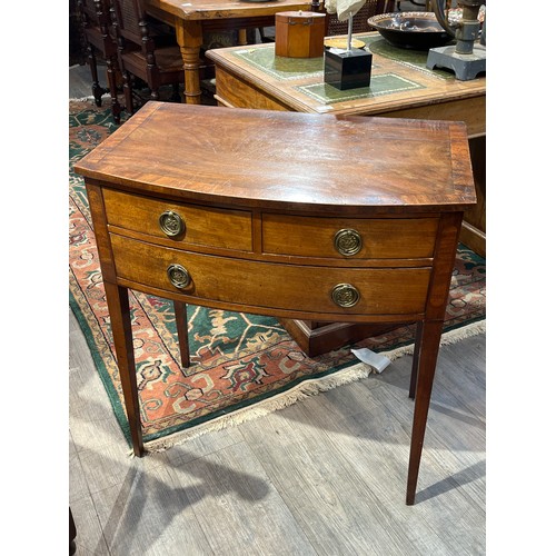 6162 - A late George III mahogany bow-fronted mahogany side table, two drawers over single long drawer, on ... 